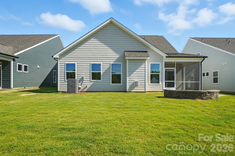 Exterior details and patio area of a home in Heritage - 55+ Community, Indian Trail (Image 25).