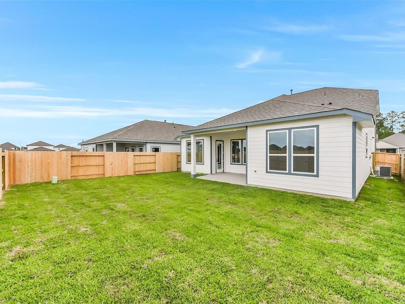 Exterior details and patio area of a home in Sundance Cove, Crosby (Image 28).