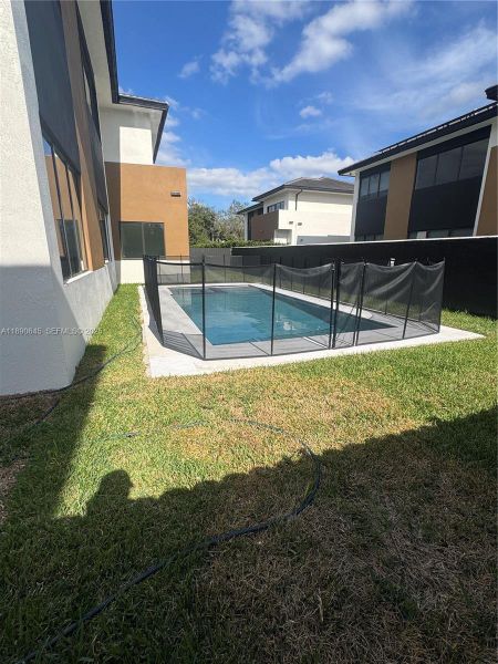 Exterior details and patio area of a home in , Miami (Image 8).