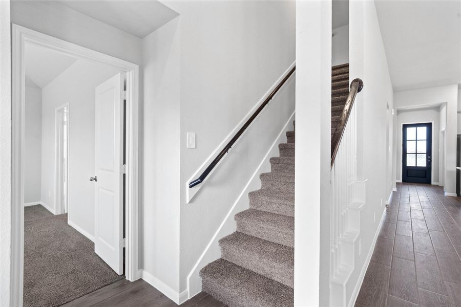 Head upstairs to the Loft and secondary bedrooms and bathroom.