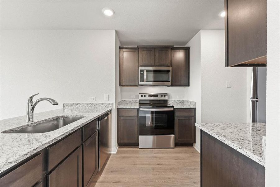 Furnished interior view inside a new home in Retreat at Fossil Creek, Fort Worth (Image 5).