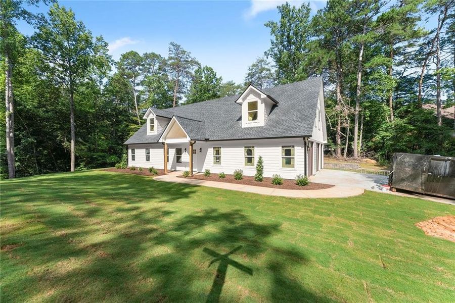 Front exterior of a new home in , Gainesville, GA, highlighting curb appeal (Image 21). Front exterior of a new home in , Gainesville, GA, highlighting curb appeal (Image 21).