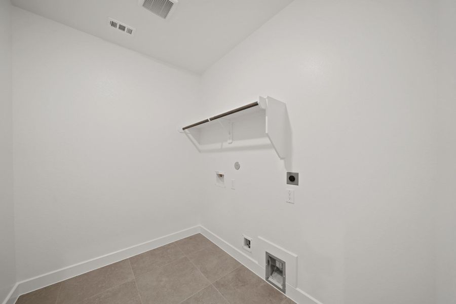 Laundry room (*Photo not of actual home and used for illustration purposes only.)