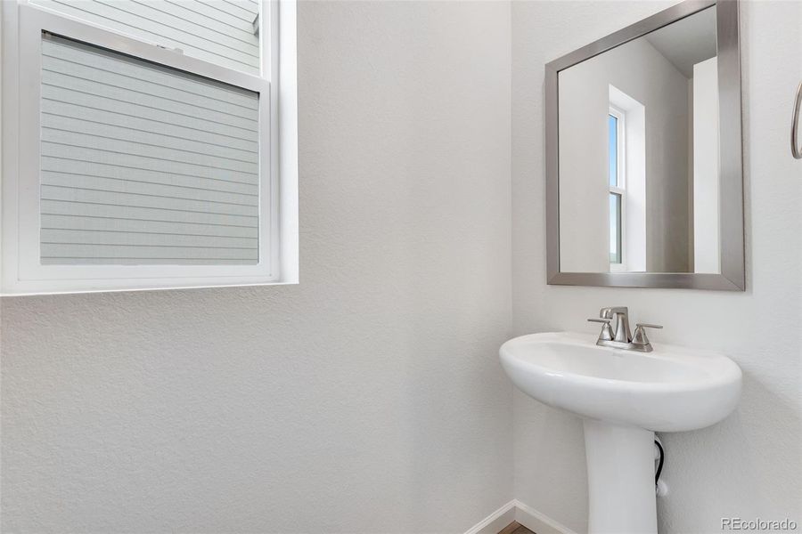 Close-up of interior finishes inside a home in Reunion, Commerce City (Image 17).