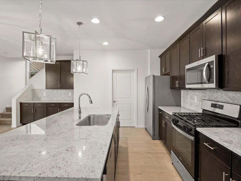 Furnished interior view inside a new home in Alamar at Rocking K, Vail (Image 4).