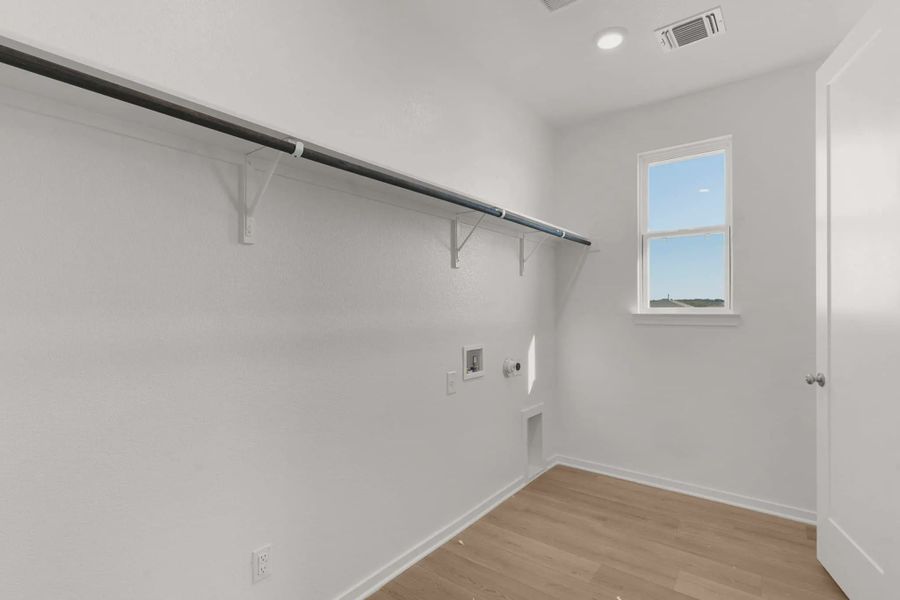 Representative unfurnished interior of a home built from the Mariah by Chesmar Homes in University Heights, McKinney (Image 46).