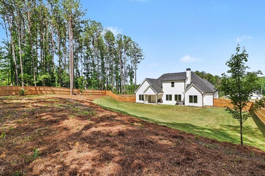 Exterior details and patio area of a home in Belle Hall, Newnan (Image 31).