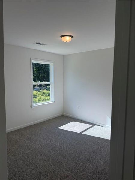 Spacious, unfurnished interior of a new home in The Brooke at Rivertown, South Fulton (Image 17).