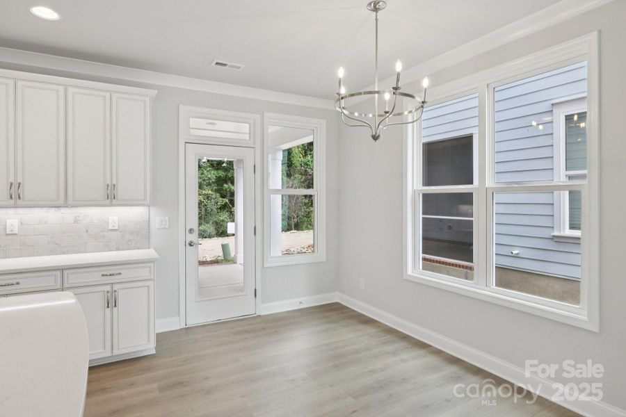 Spacious, unfurnished interior of a new home in Walk23, Huntersville (Image 29).