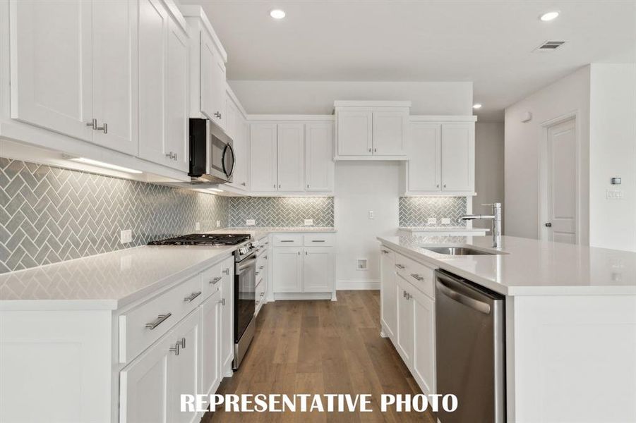With outstanding storage and prep space, this dream kitchen is the perfect place for your inner chef to create culinary masterpieces!  REPRESENTATIVE PHOTO