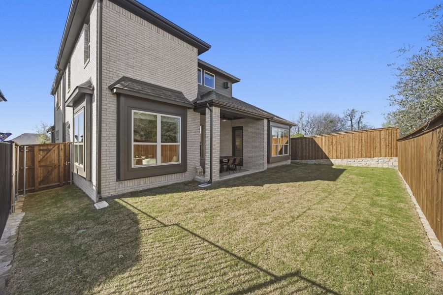 Exterior details and patio area of a home in Providence Cove, McKinney (Image 29).