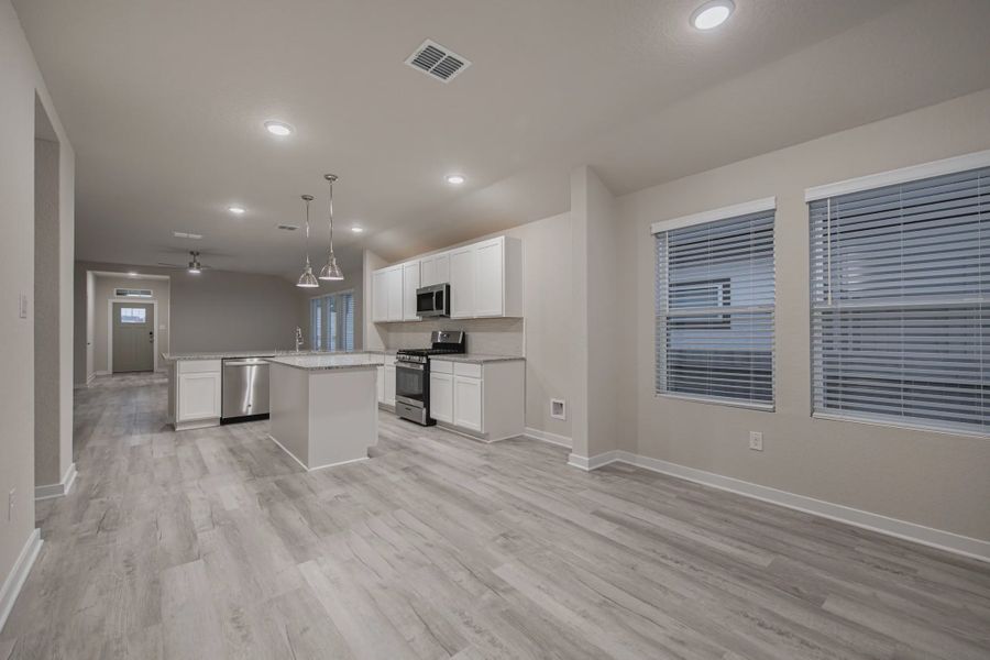 Representative unfurnished interior of a home built from the Gunther by Chesmar Homes in Briarwood, Cypress (Image 6).