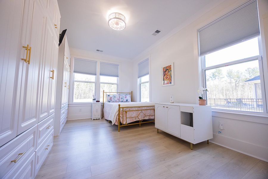 Furnished interior view inside a new home in , Ravenel (Image 48).