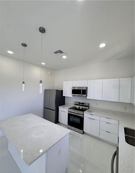 Furnished interior view inside a new home in , Cape Coral (Image 11). Furnished interior view inside a new home in , Cape Coral (Image 11).