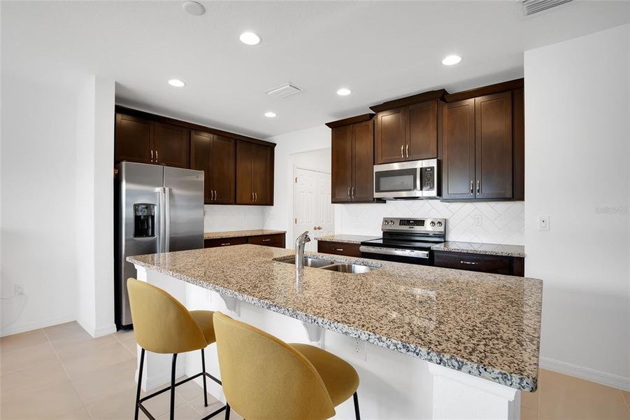 Furnished interior view inside a new home in Horse Creek at Crosswinds, Davenport (Image 9). Furnished interior view inside a new home in Horse Creek at Crosswinds, Davenport (Image 9).