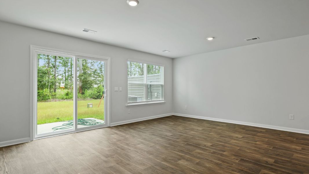 Spacious, unfurnished interior of a new home in Pine Hills Townhomes at Cane Bay, Summerville (Image 10).