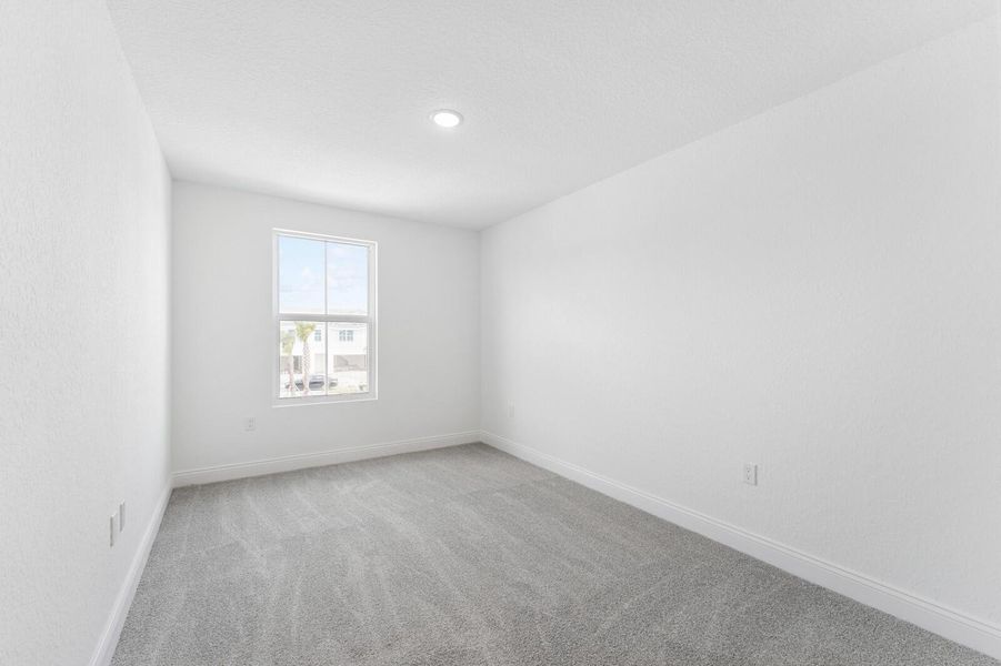 Spacious, unfurnished interior of a new home in Salerno Reserve Townhomes, Stuart (Image 17).
