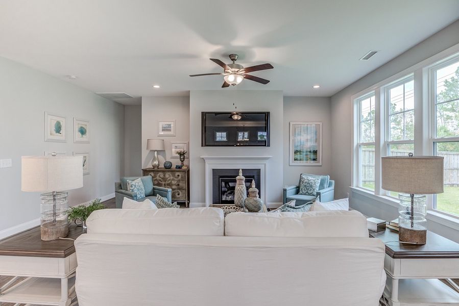 Representative furnished interior of a home built from the The Amherst by RobuckHomes in Windwater, Hampstead (Image 11).