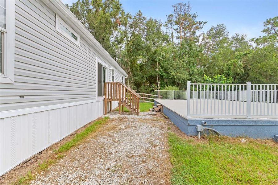 Exterior details and patio area of a home in , Brooksville (Image 33).