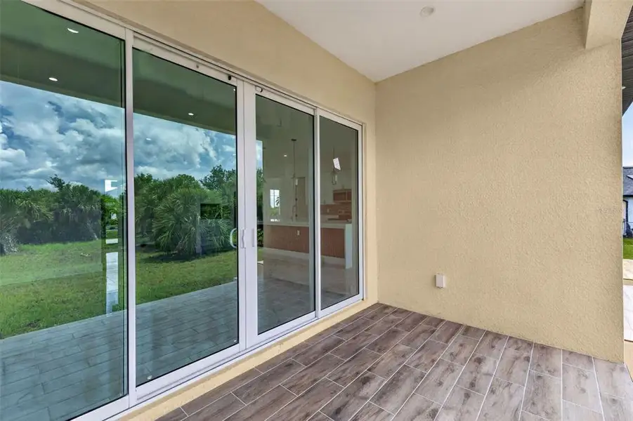 Exterior details and patio area of a home in , Port Charlotte (Image 4). Exterior details and patio area of a home in , Port Charlotte (Image 4).