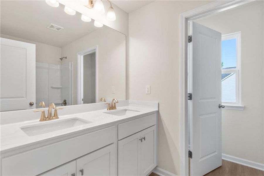 Furnished interior view inside a new home in The Village at Shallowford, Kennesaw (Image 17). Furnished interior view inside a new home in The Village at Shallowford, Kennesaw (Image 17).