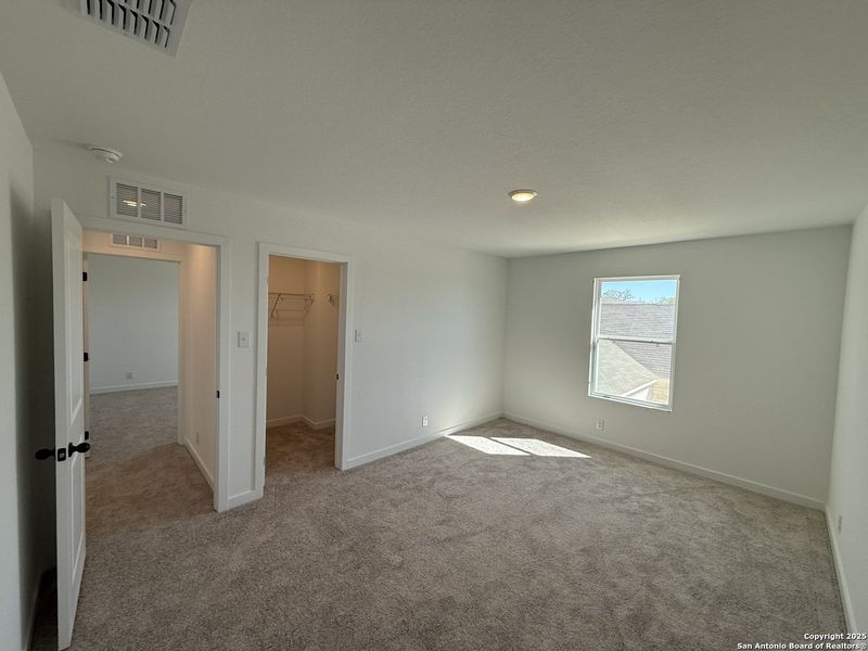 Spacious, unfurnished interior of a new home in The Preserve at the Wilder, Adkins (Image 23).