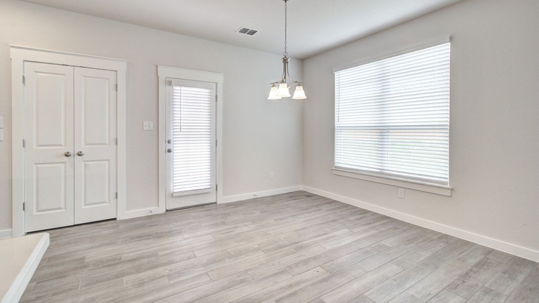 Representative furnished interior of a home built from the Majestic by Brightland Homes in Mostyn Springs, Magnolia (Image 9).