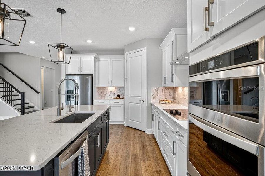 Furnished interior view inside a new home in Legends Preserve - Reserve Series, Daytona Beach (Image 7). Furnished interior view inside a new home in Legends Preserve - Reserve Series, Daytona Beach (Image 7).
