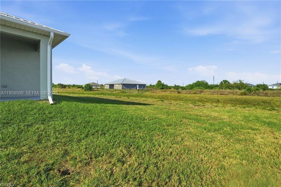 Exterior details and patio area of a home in , Labelle (Image 24).