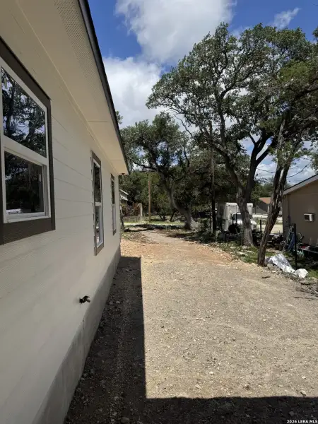 Exterior details and patio area of a home in , Spring Branch (Image 21).