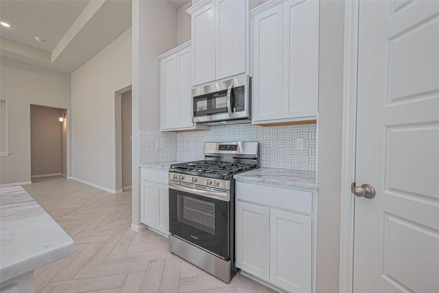 Furnished interior view inside a new home in La Segarra, Brookshire (Image 9).