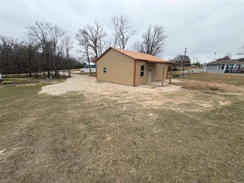 Exterior details and patio area of a home in , Quitman (Image 11).