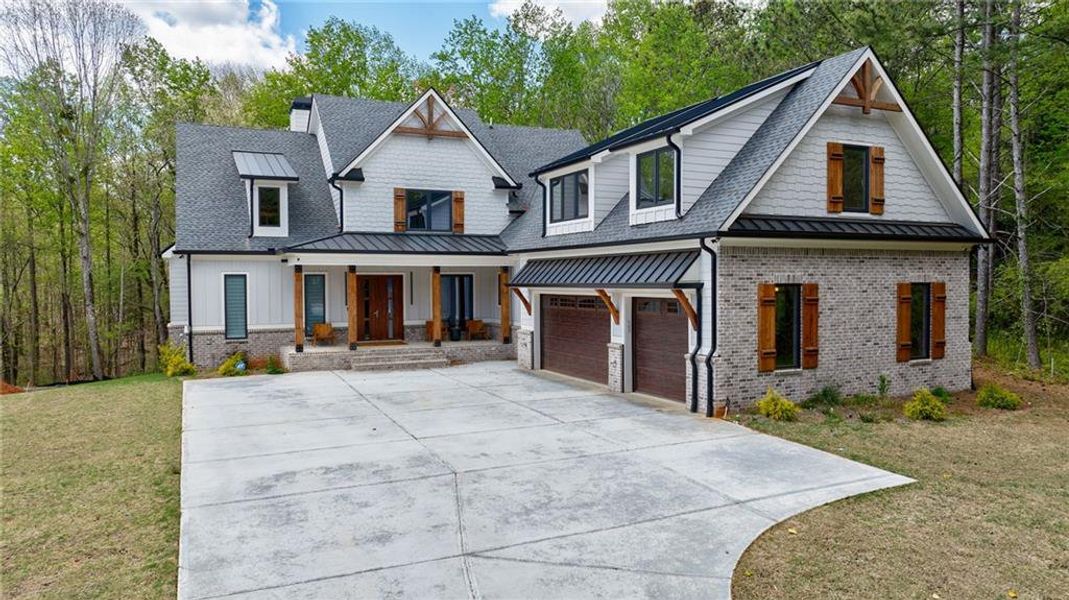 Front exterior of a new home in , Sugar Hill, GA, highlighting curb appeal (Image 26).