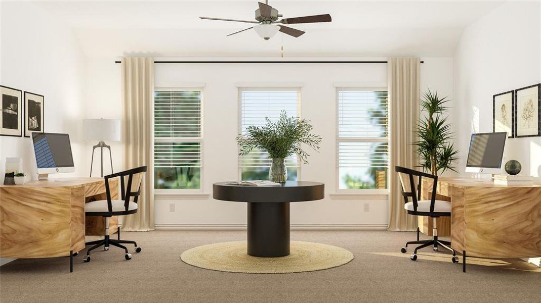 Carpeted office space with ceiling fan and vaulted ceiling