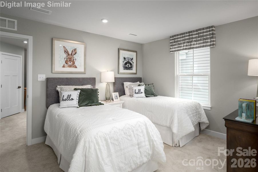 Sharing is caring in this bright and cheerful kids’ bedroom, perfectly sized for twin beds and endless memories. With plenty of space to play and personalize, it’s a blank canvas for creativity—whether it’s superhero posters, fairy lights, or game zones.