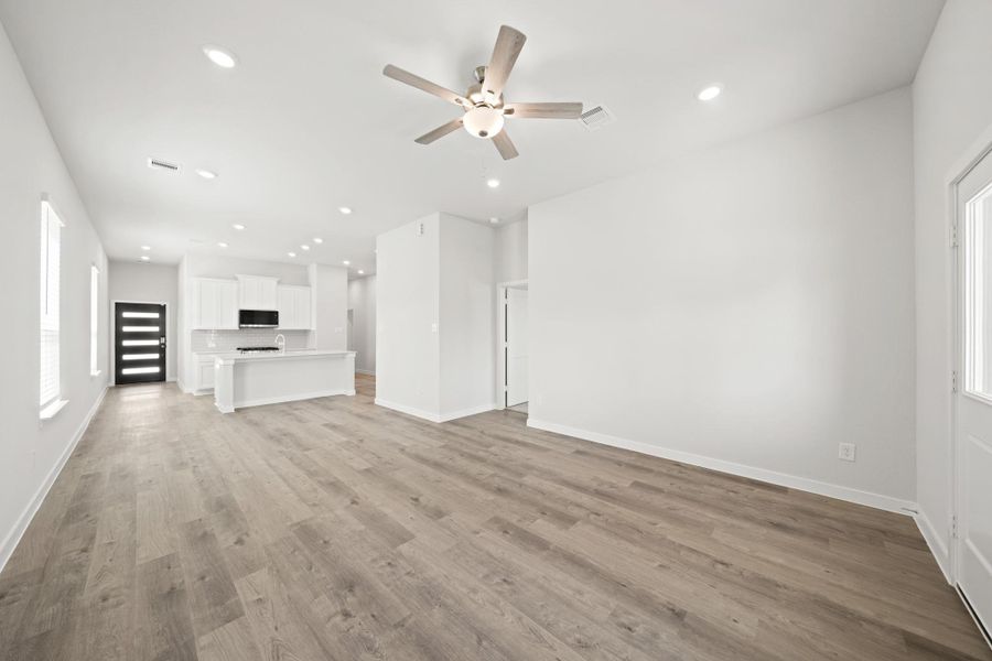 Spacious, unfurnished interior of a new home in Creekland Village at Bridgeland, Cypress (Image 13).