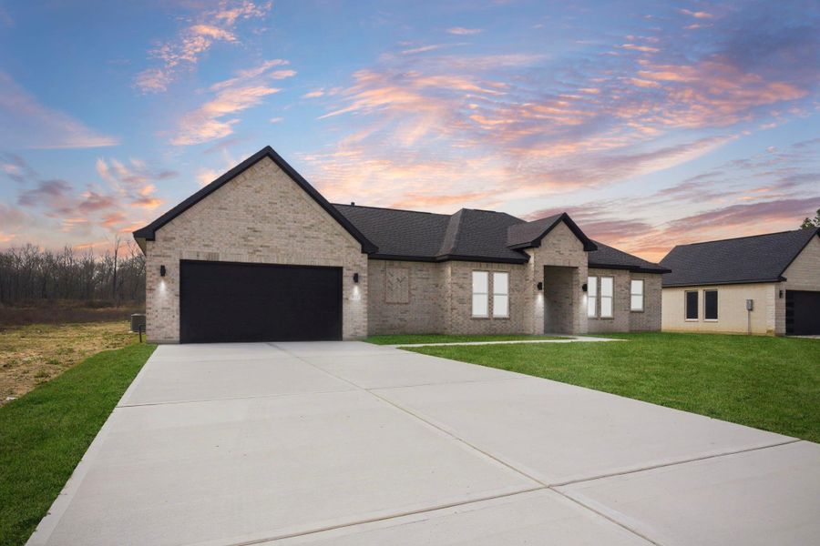 Front exterior of a new home in , Dayton, TX, highlighting curb appeal (Image 29).