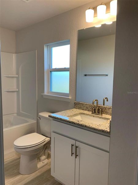 Furnished interior view inside a new home in Twisted Oaks, Beverly Hills (Image 6).