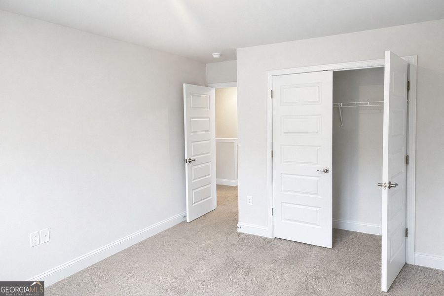 Spacious, unfurnished interior of a new home in Canterbury Villas, Carrollton (Image 21).