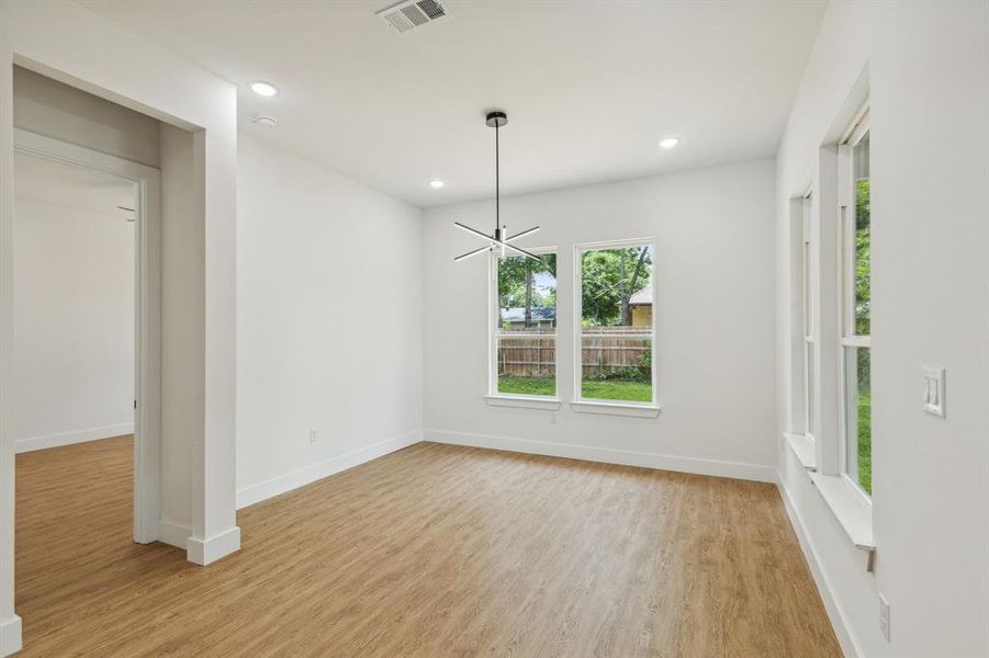 Empty room featuring light wood-type flooring