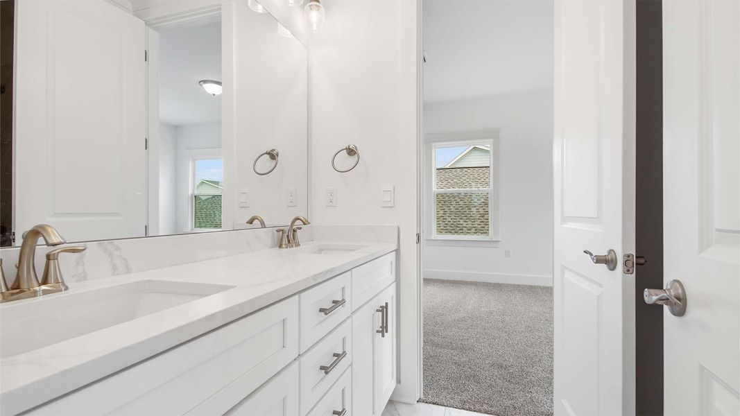 Furnished interior view inside a new home in Breakfast Point East Phase I, Panama City Beach (Image 12).