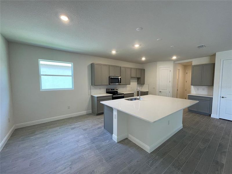 Furnished interior view inside a new home in Angeline, Land O' Lakes (Image 5).