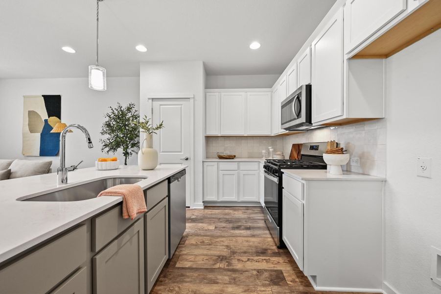 **Photos are of a different unit. Color schemes and finishes may differ**