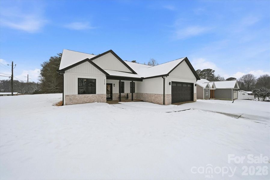 Front exterior of a new home in , Maiden, NC, highlighting curb appeal (Image 24).