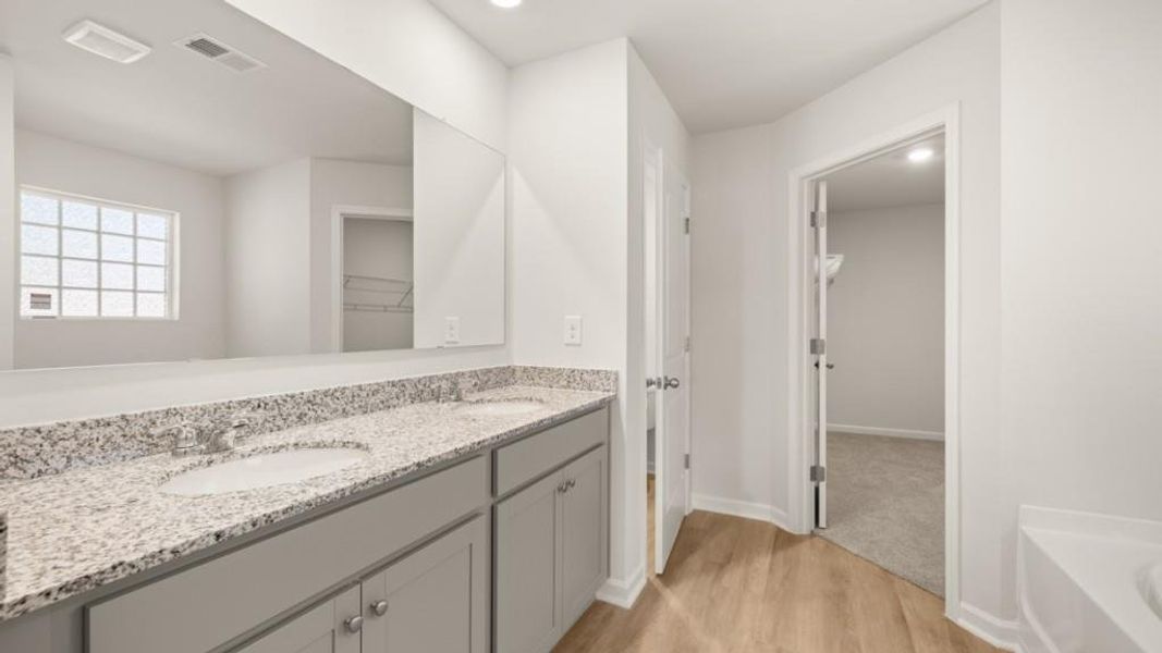 Furnished interior view inside a new home in Northwoods at Mirror Lake, Villa Rica (Image 7).