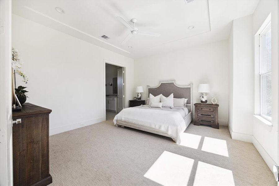 Tranquil Master Retreat – This owner’s is designed with a resort style suite in mind. The spaces feature a bed wall anchored with wall scones, recessed ceiling, surround sound, designated space for seating, dressers, and bedside tables.