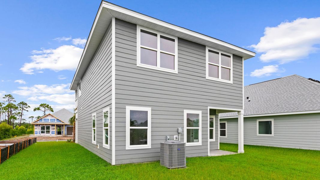 Exterior details and patio area of a home in WindMark Beach, Port Saint Joe (Image 24).