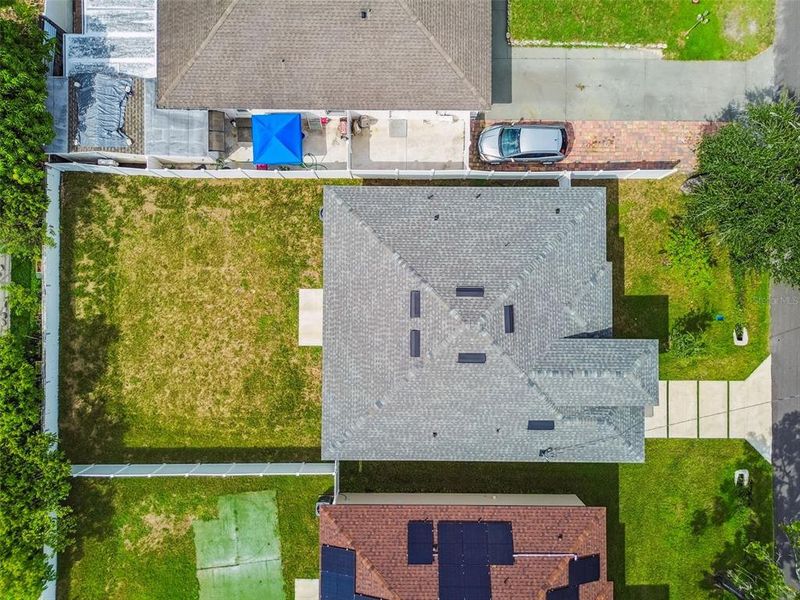 Front exterior of a new home in , Tampa, FL, highlighting curb appeal (Image 26).
