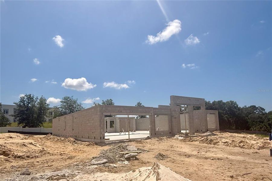 Front exterior of a new home in Wolf Lake Ranch, Apopka, FL, highlighting curb appeal (Image 7).