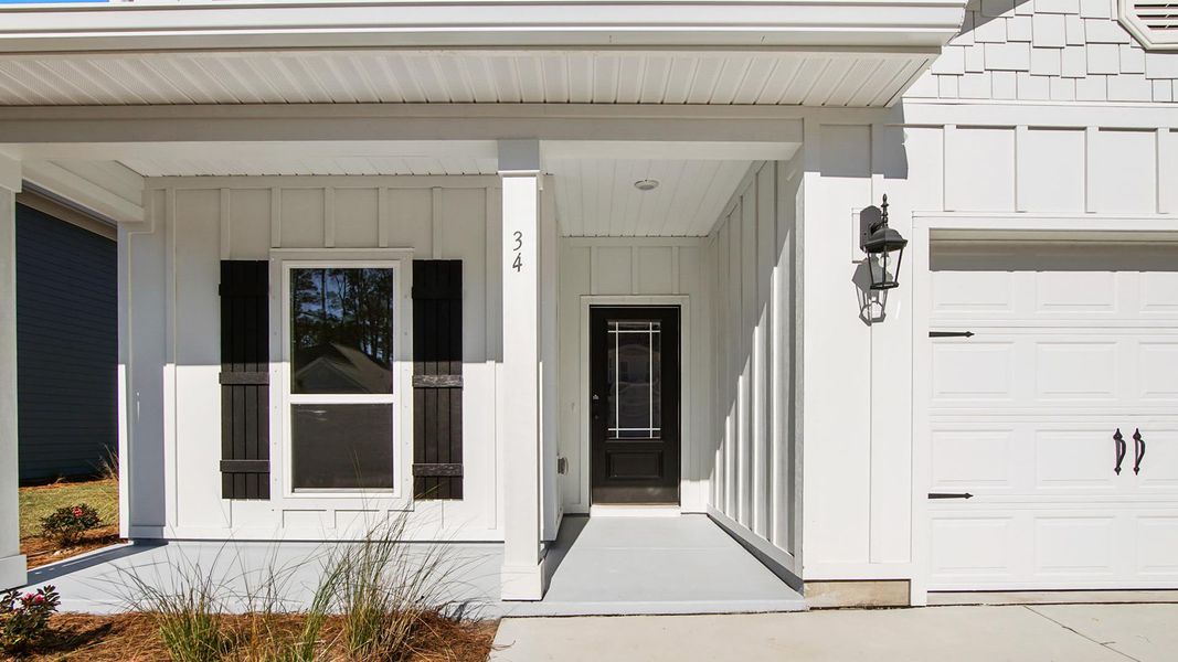 Exterior details and patio area of a home in WindMark Beach, Port Saint Joe (Image 3).